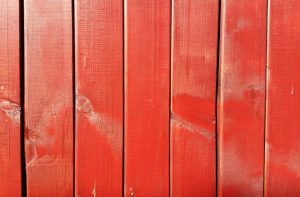 close-up of red wood fence